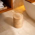 Woven rattan bin with rotating lid, top-down view showing the round woven lid