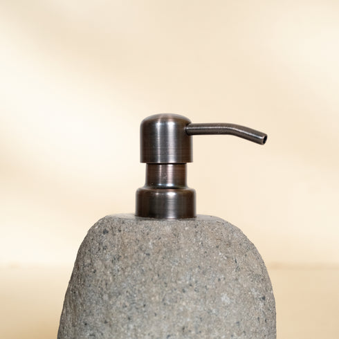 Natural stone soap dispenser, angled view