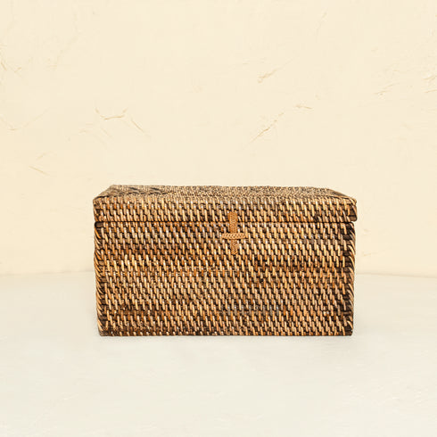 Dark brown rattan toilet roll storage box close up handwoven