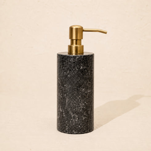Black marble soap dispenser with satin gold metal pump