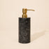 Black marble soap dispenser with satin gold metal pump