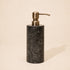 Black marble soap dispenser with antique brass metal pump
