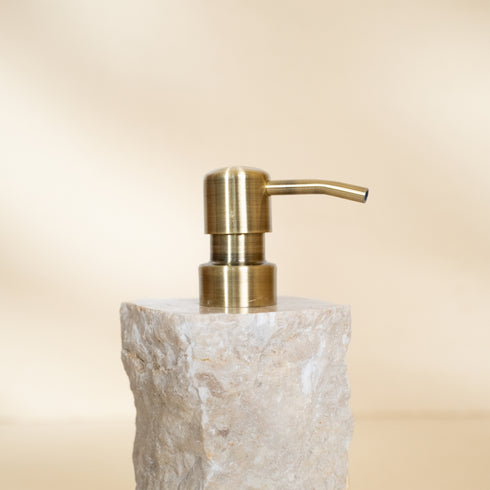 Textured marble dispenser, angled view