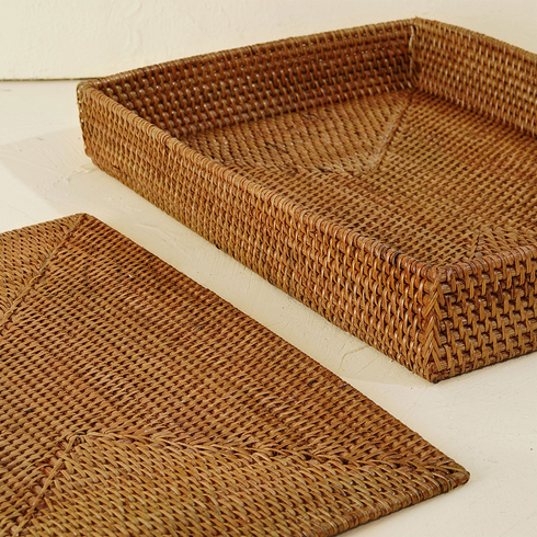 Honey brown rectangular rattan placemats with holder styled