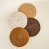 Natural round rattan placemats with holder styled