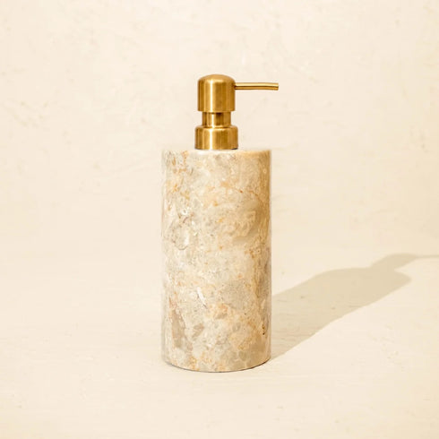 Beige marble soap dispenser with satin gold metal pump
