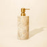 Beige marble soap dispenser with satin gold metal pump