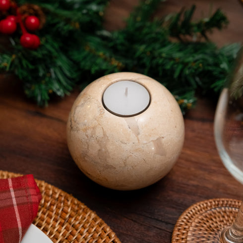 Beige marble sphere decoration on Christmas table