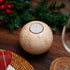Beige marble sphere decoration on Christmas table