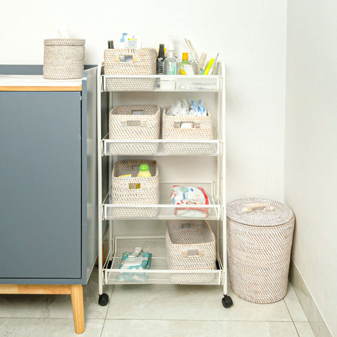 Nappy storage with white storage baskets