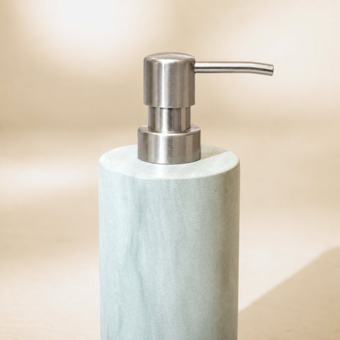 Close-up of Zeolite stone soap dispenser with brushed steel pump