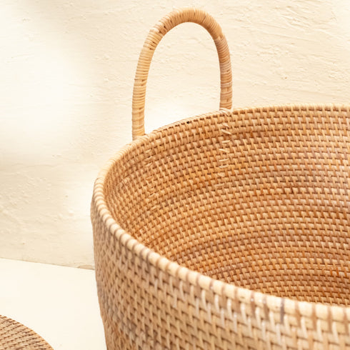 Handles woven in to the basket with rattan weaves