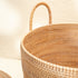 Handles woven in to the basket with rattan weaves