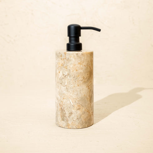 Beige marble soap dispenser with matt black metal pump