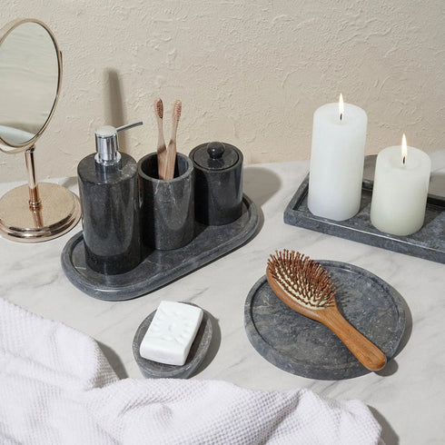 Black marble bathroom accessories set styled