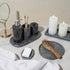 Black marble bathroom accessories set styled