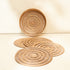 White wash spiral rattan placemats with holder texture detail