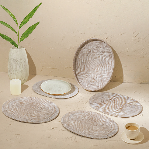 White wash oval rattan placemats with holder close up