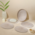 White wash oval rattan placemats with holder close up
