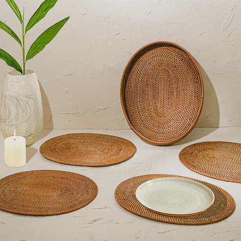 Honey brown oval rattan placemats with holder set