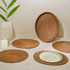 Honey brown oval rattan placemats with holder set