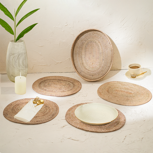 Natural oval rattan placemats with holder close up