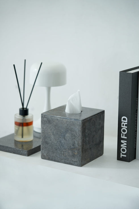 Square black tissue box on shlef