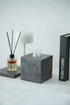 Square black tissue box on shlef