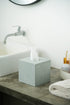 Zolite tissue box by basin