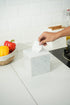 Carrera marble tissue box on kitchen counter