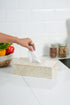 Beige marble tissue box in kitchen counter