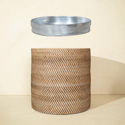 Handwoven rattan planter with removable metal tray insert shown in exploded view for drainage and plant care