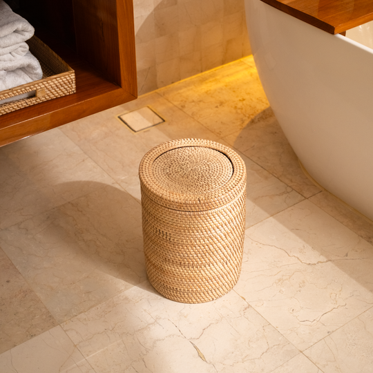 Woven rattan bin with rotating lid, top-down view showing the round woven lid