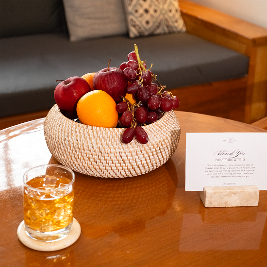 Hotel welcome setting with natural rattan and marble pieces