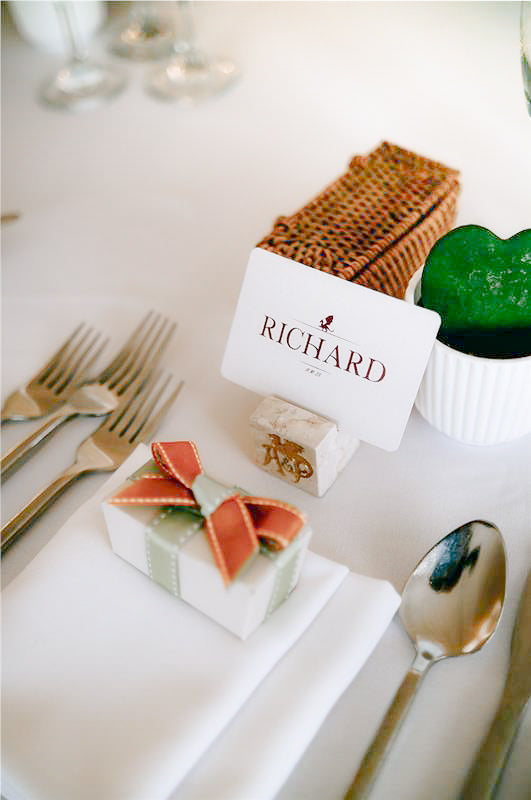 Rattan and marble wedding table styling detail