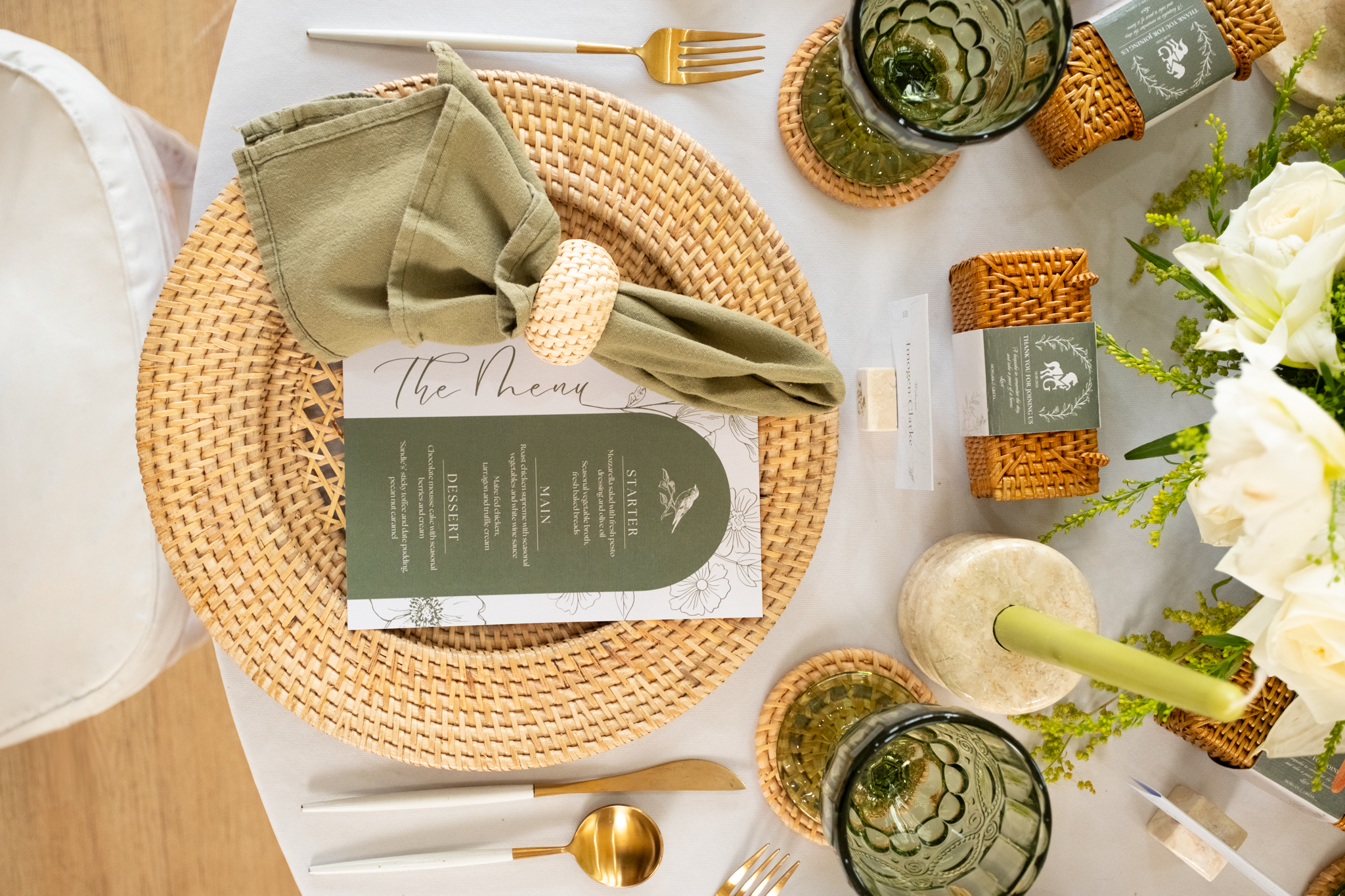 Wedding table styling with handmade rattan and marble decor